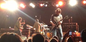 Mike Cooley solos during a Drive-By Truckers song at The Crossroads in Kansas City, Missouri on 5/25/13 with Patterson Hood, Matt Patton and The EZB in the background.