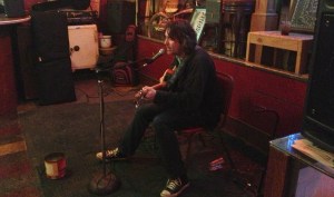 Songwriter Tracy Huffman raids his songbook at a weekly show at Magoon's in St. Joseph, Missouri.