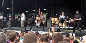 Gogol Bordello whips the crowd into a frenzy at Cricket Wireless Amphitheater in Bonner Springs, KS on 8/3/13.