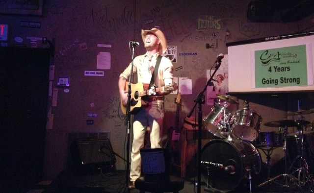 Sexwolph (Wade Williamson) belts out a song without the normal comfort of a backing band at The Cafe Acoustic on 11/9/13.