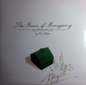 An autographed copy of the solo debut from Tim Kasher "The Game of Monogamy" on vinyl obtained at the living room show in Kansas City, MO.