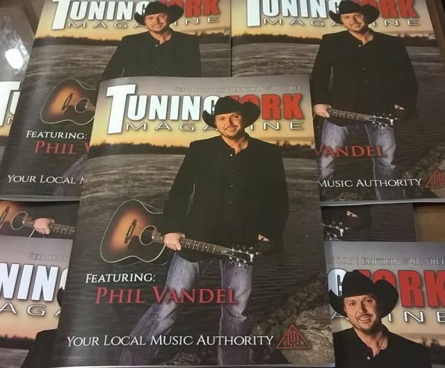 A stack of the Tuning Fork Magazine Phil Vandel was on the cover of in February 2015. Cover photo by Heather Kirchhoff