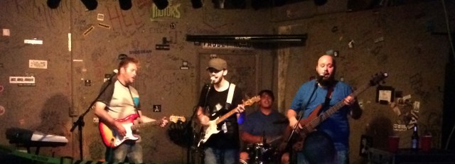 The Coterie performing live at Cafe Acoustic on 7/16/15. From left: Tanner Ferguson, Matthew Coman, Christgen Solomon and Andy Blumer.